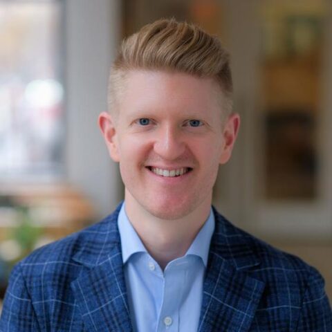 Headshot of Mark Huelsman